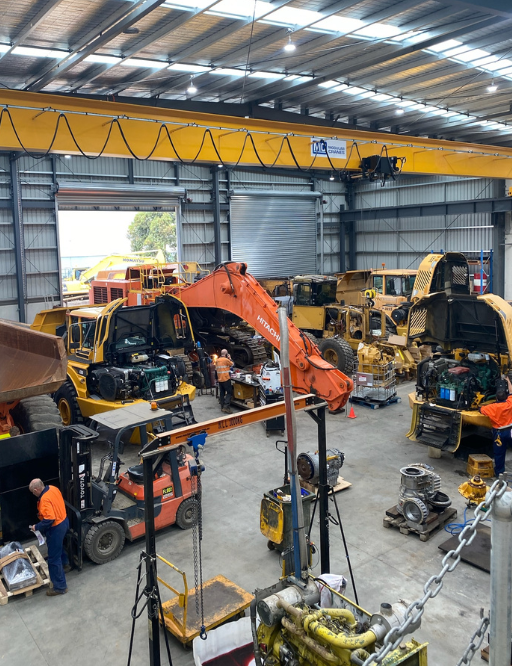 Image of the Highway Tractor Spares workshop with staff working of the refurbishment of Volvo Heavy Equipment